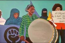 Hey Feminists! Stay steadfast! This is a girls' revolution! Painting Sudanese women's protest