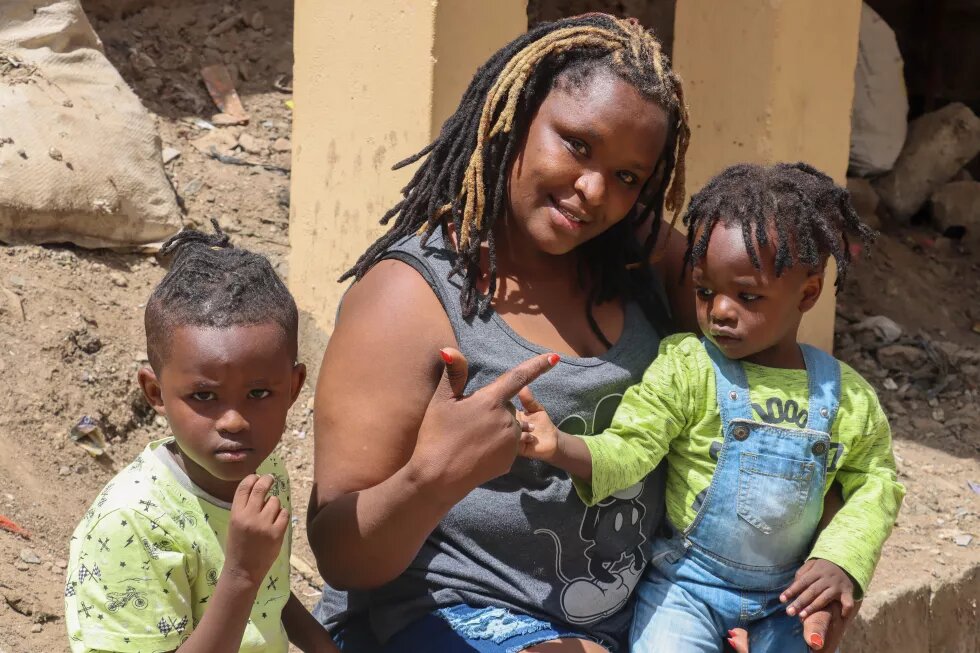 Mariam Nduta and her two children