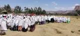 A funeral procession for fallen fighters in Siheta/Tigray, October 2023 Women in traditional dress gathered in an open field